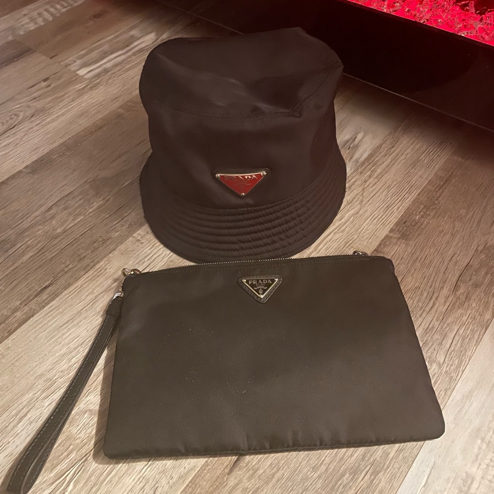 Prada wristlet all black perfect for a night out at the club.